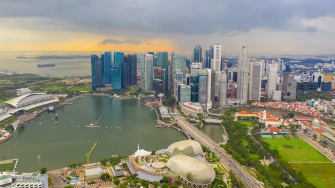 日落风暴天空新加坡城市著名滨海湾市中心空中延时全景4k