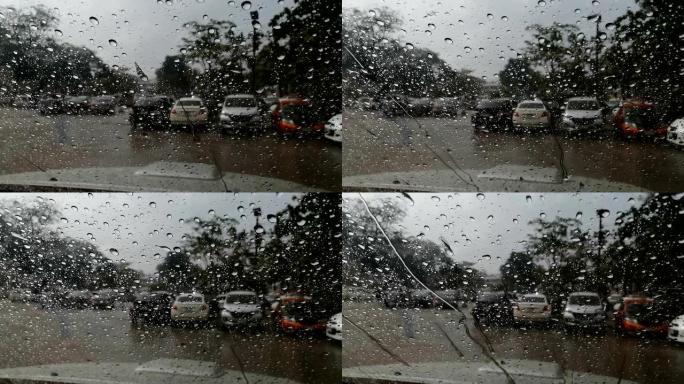 来自汽车后视镜前的雨水摄像头的图片