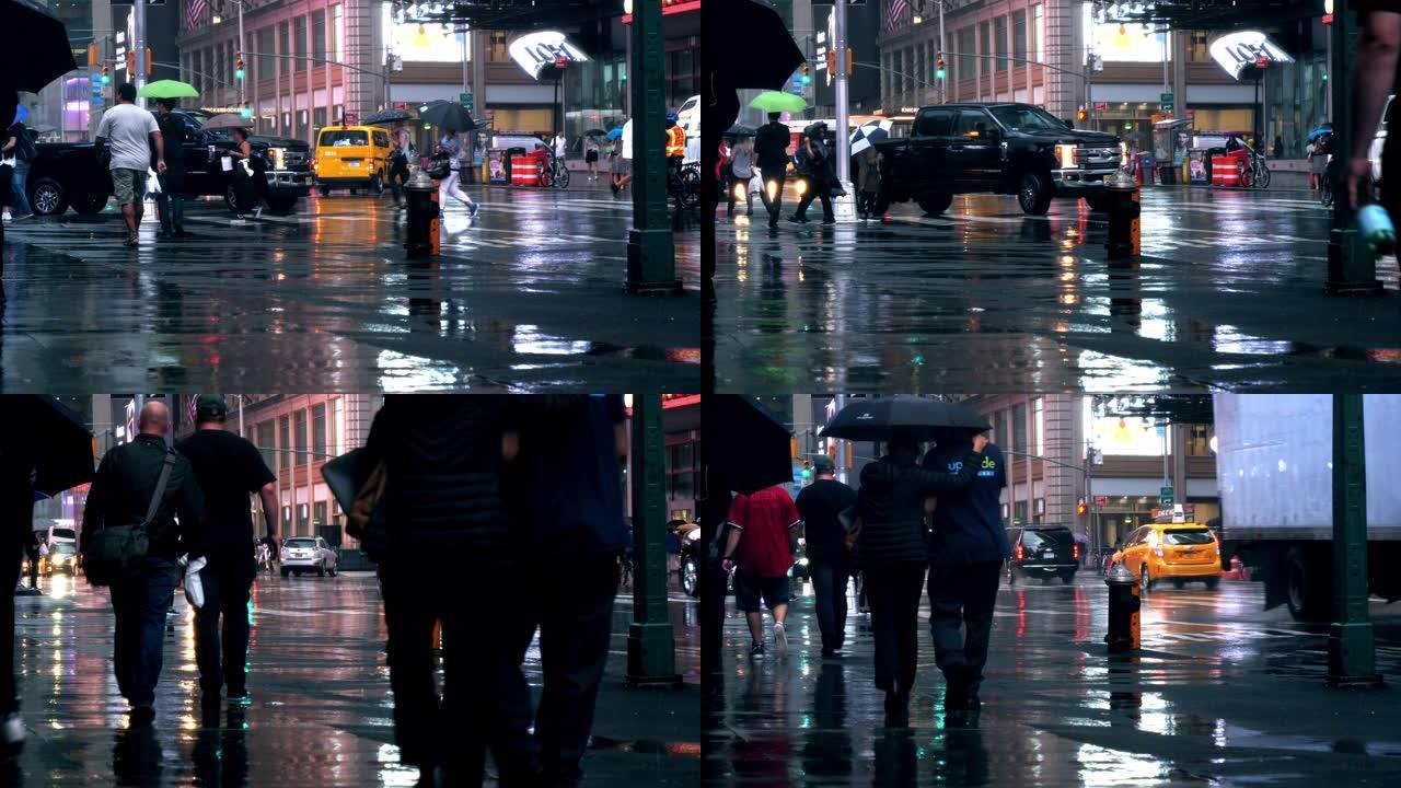 纽约，第六大道下着雨的上下班时间。