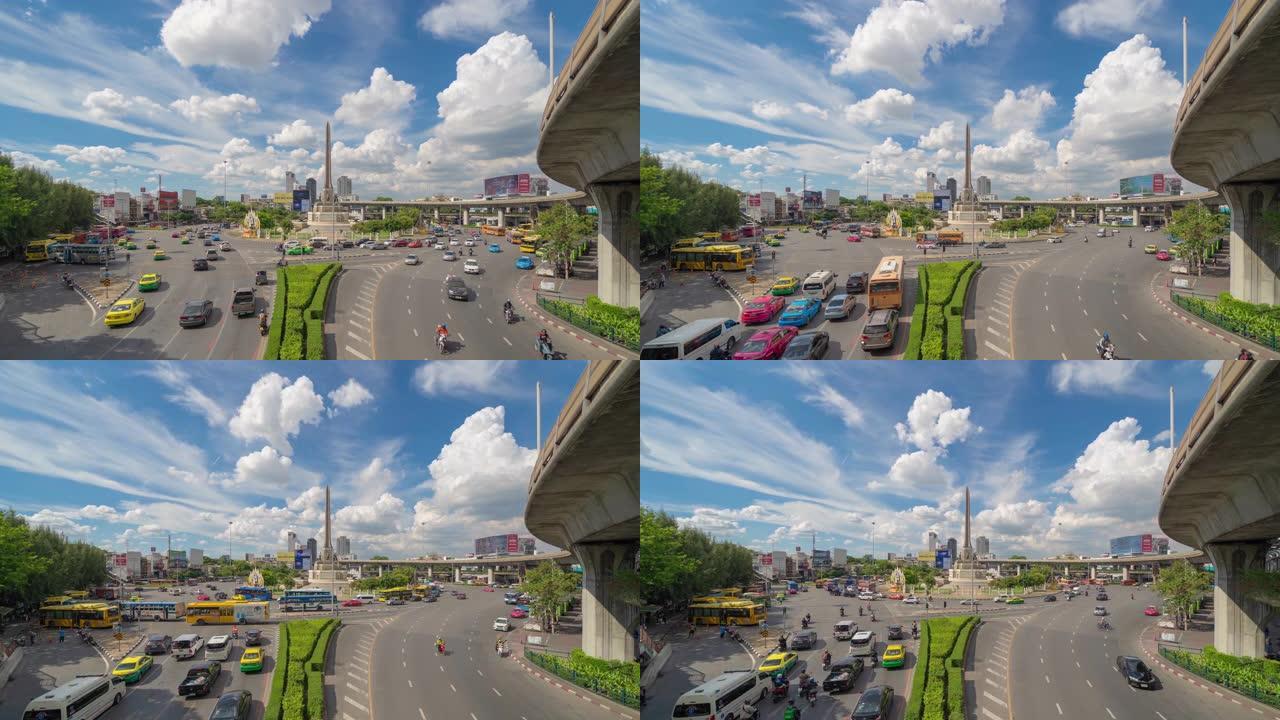 繁忙街道路上胜利纪念碑的时间流逝。曼谷市中心天际线的环形交叉路口。泰国。智慧城市金融区中心。蓝天的摩