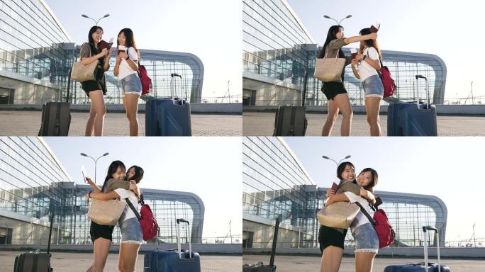 迷人的热情洋溢的亚洲女性的慢动作使他们在机场大楼附近的飞机上共同旅行感到高兴