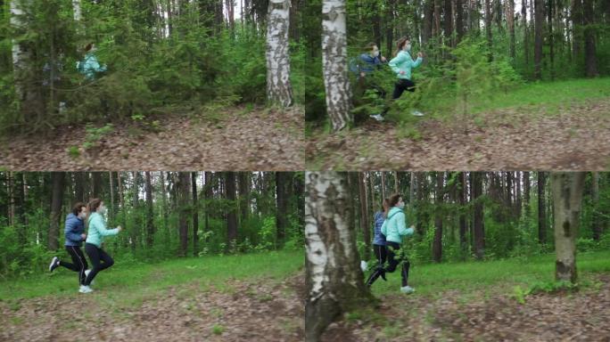 公园里跑步的人。年轻的运动夫妇戴着面具在森林里奔跑