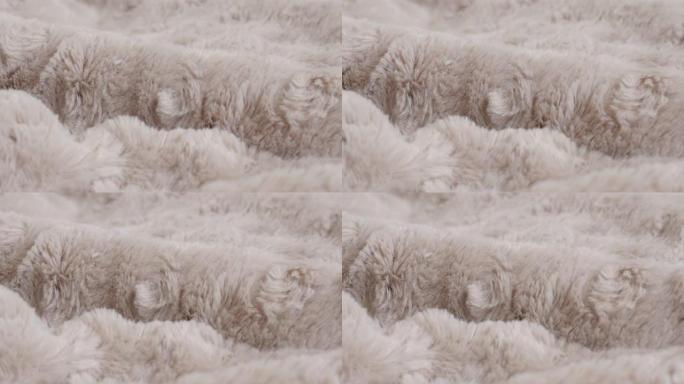人造毛皮毯子收集特写4k平移镜头