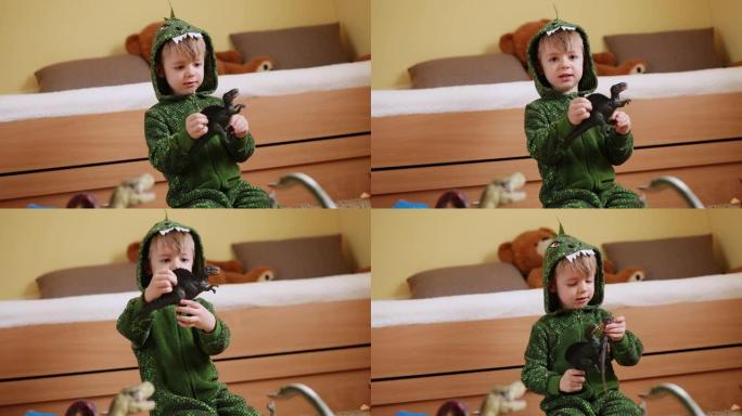 男孩玩他的恐龙