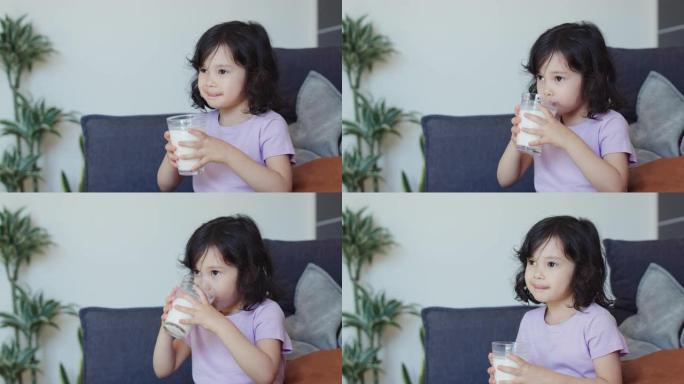 年轻女孩喝牛奶