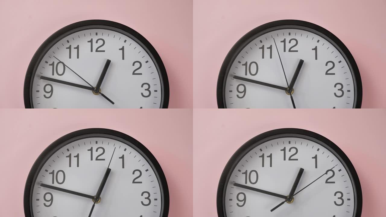 单白色办公室时钟挂在粉红色的墙上