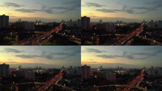 日落天空飞行飞越雅加达市中心交通街道路空中全景4k印度尼西亚