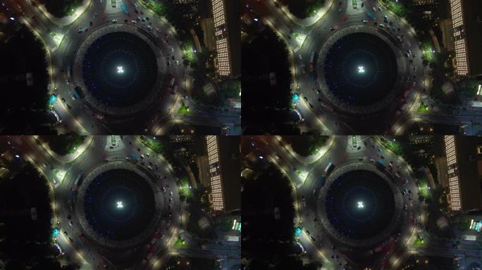 夜间照明雅加达市中心交通街圈喷泉空中俯拍全景4k印度尼西亚