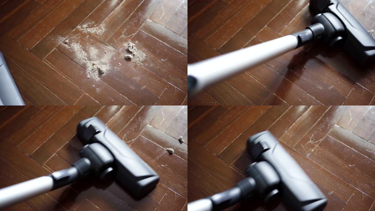 使用真空吸尘器清洁地板上的灰尘