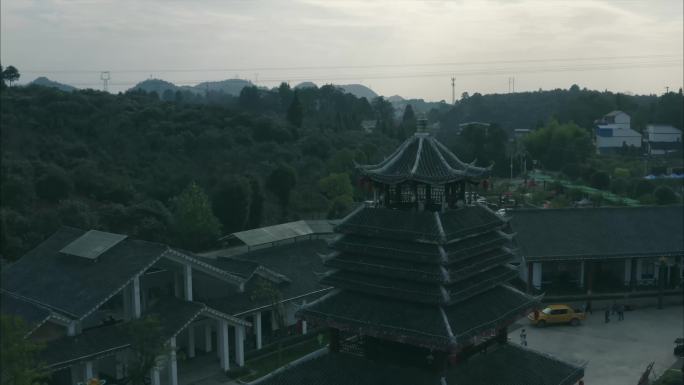 贵州玉屏茶花泉景区、玉屏洞箫雕塑、风雨桥