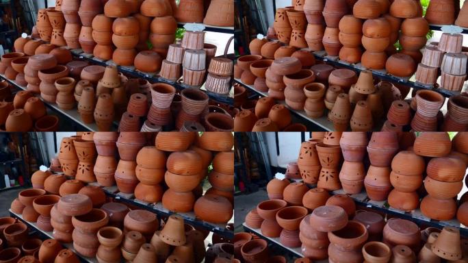 花店出售各种形状和尺寸的花卉粘土棕色盆