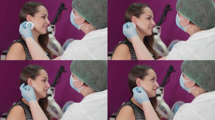 女医生为客户进行耳洞穿刺手术