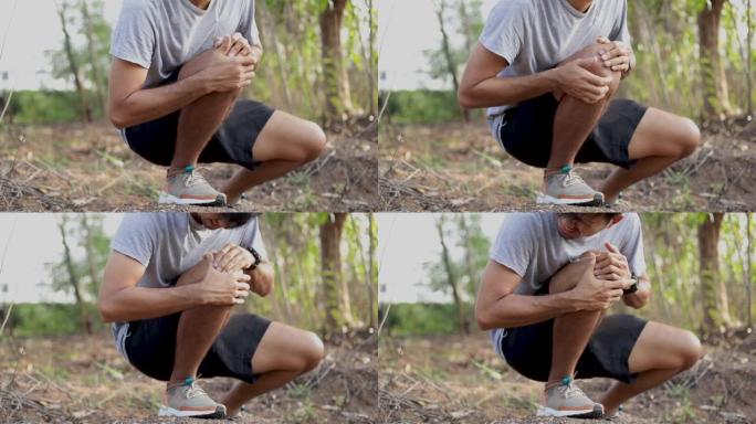 运动亚洲男子因运动而膝盖疼痛