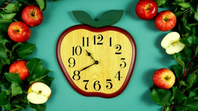 苹果创意概念平板形状的时钟。