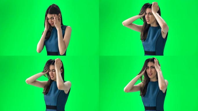 女人有痛苦和触摸她的太阳穴