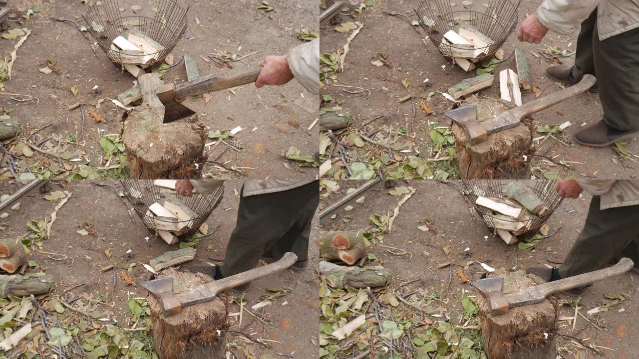 在一个贫穷的俄罗斯村庄，爷爷用斧头在树桩上砍柴。秋天村院子。为冬天砍柴。