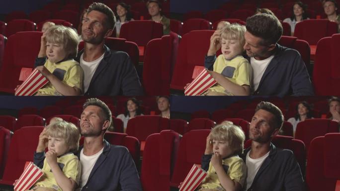 父子一起在电影院里