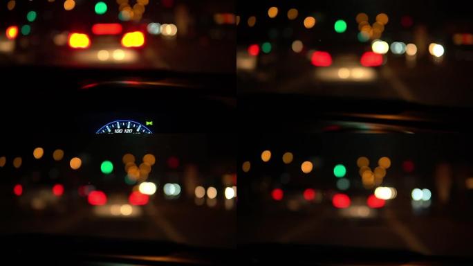 夜间道路上交通信号灯的模糊镜头
