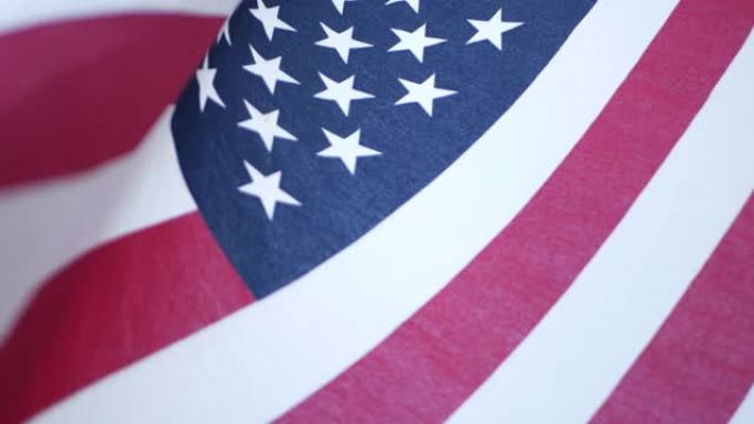 柔和的焦点特写美国旧荣耀旗帜在风中挥舞。星条旗民主、爱国、自由和独立日象征。星条旗，民族自豪感和自由
