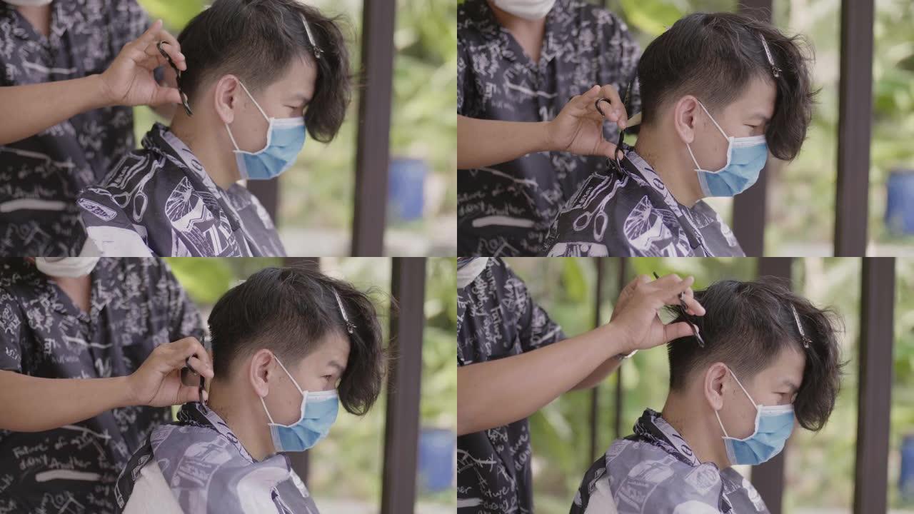 理发师在剪头发时会戴上面罩。