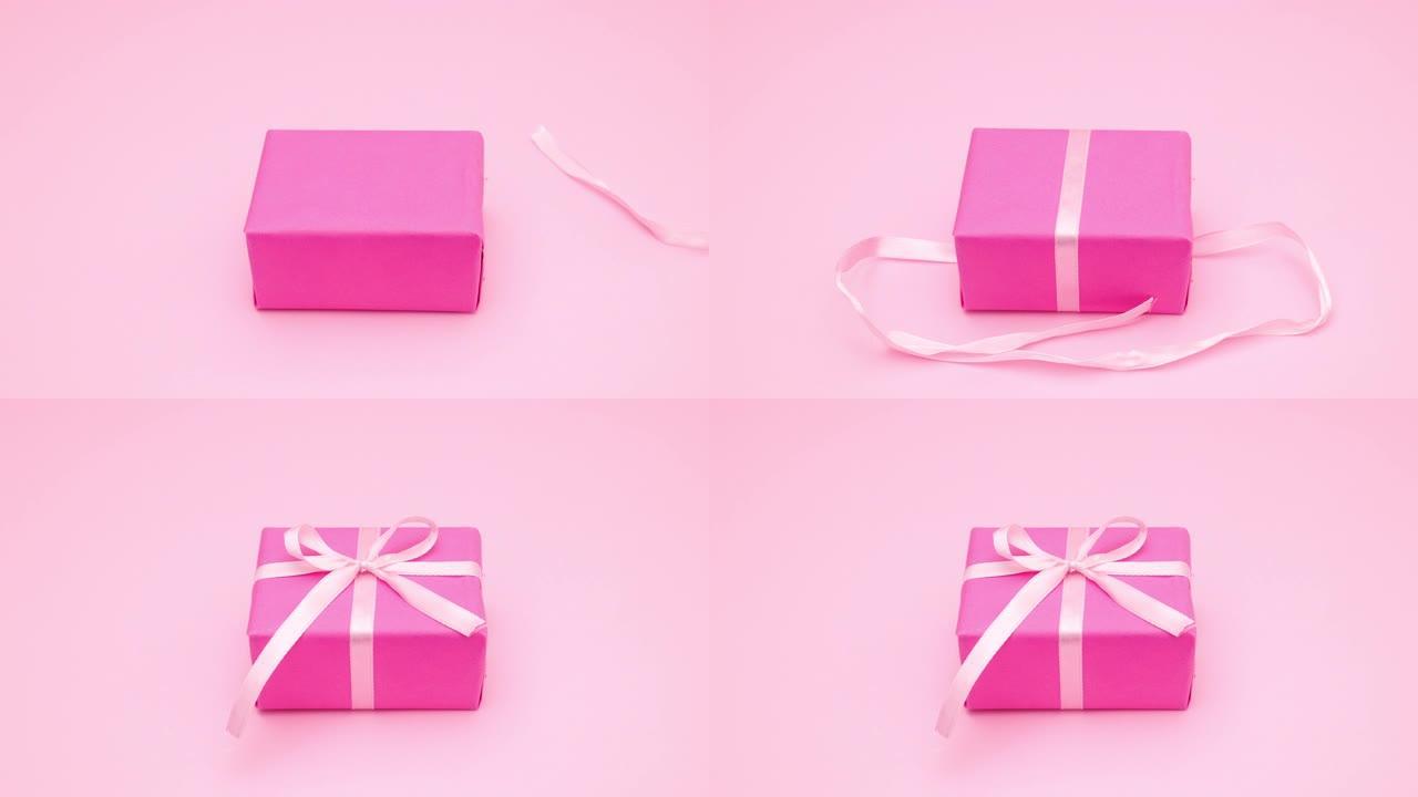 在粉色礼物上系上粉红丝带。停止运动