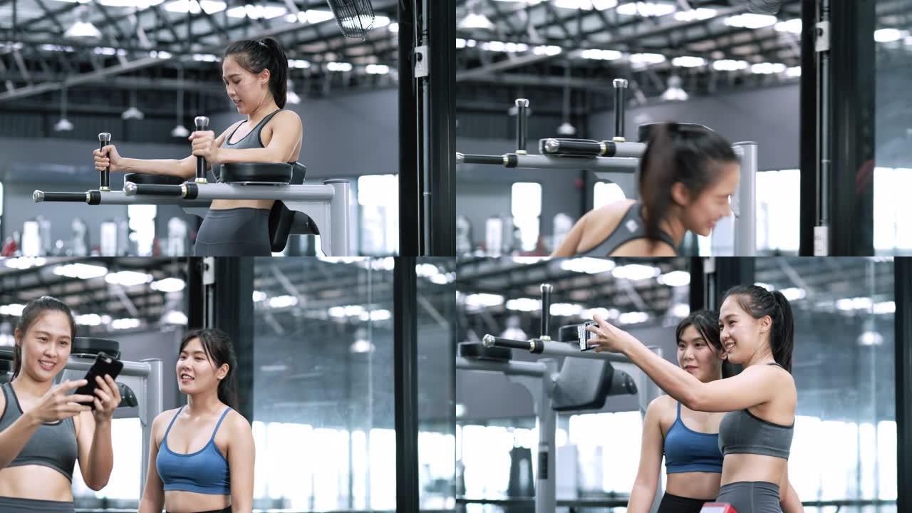 运动年轻的亚洲女性在健身馆做体重锻炼，女性锻炼训练身体强壮健康的健美，运动员健美肌肉生活方式概念。