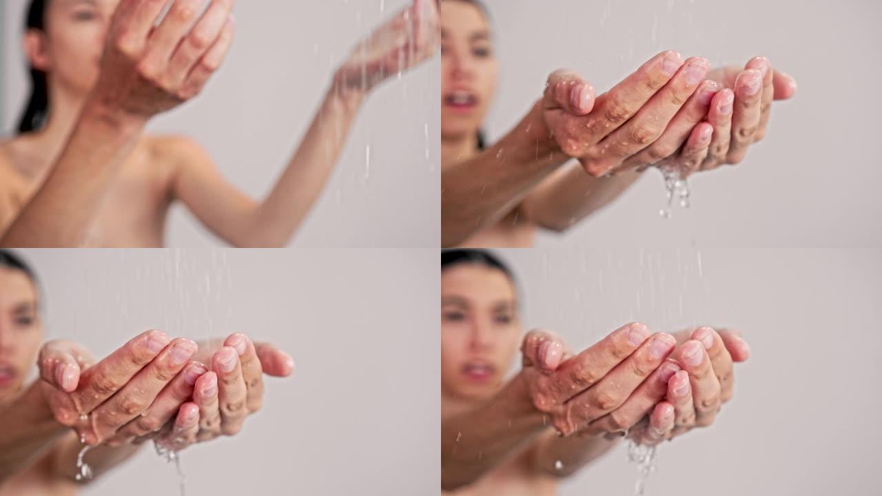 水滴落在女人的手中