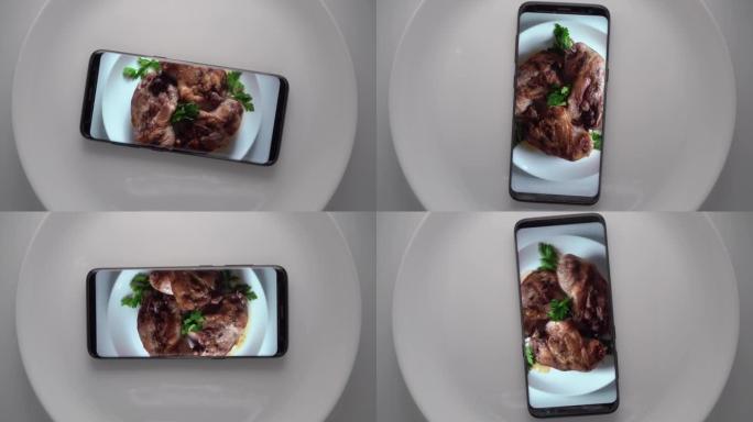 手机放在盘子里，用微波炉在屏幕上放炸鸡腿。美食博客