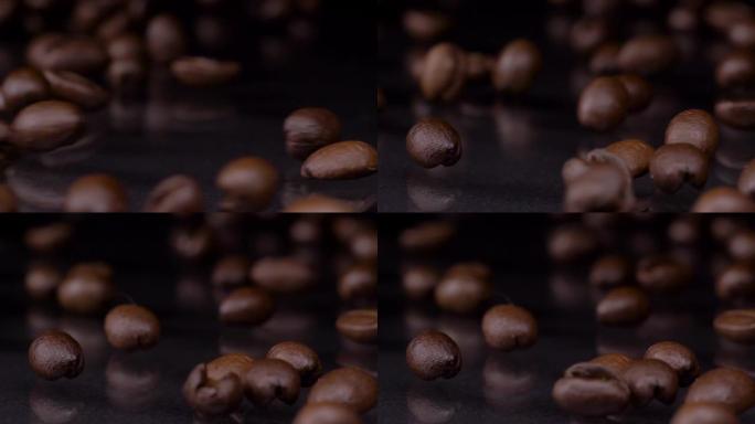 煮咖啡。超级慢动作拍摄的优质新鲜烤棕色咖啡豆滚动，落在木桌上，深色背景。咖啡谷物关闭4k视频