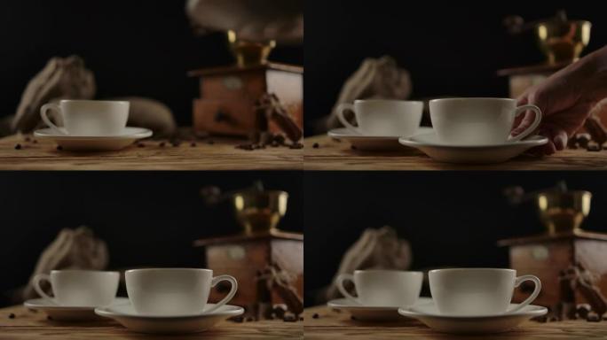 第二个白色陶瓷杯的外观，桌上有咖啡或茶。多莉开枪