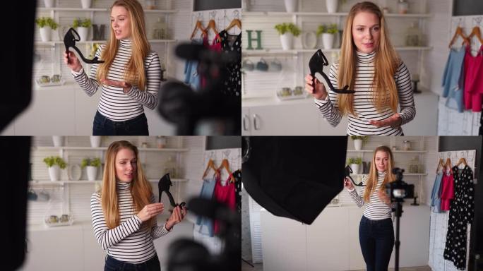 穿着牛仔裤和高领毛衣的时尚博客女性在相机上展示高跟鞋。造型师影响者女孩为她的频道展示时尚鞋类拍摄vl