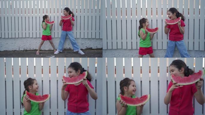 两个萌妹子吃西瓜互逗笑