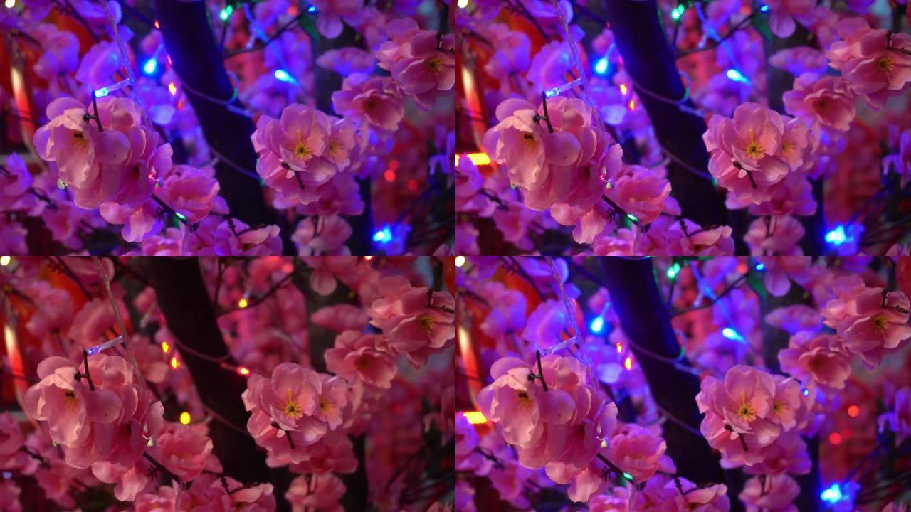 带发光二极管灯装饰的人造梅花