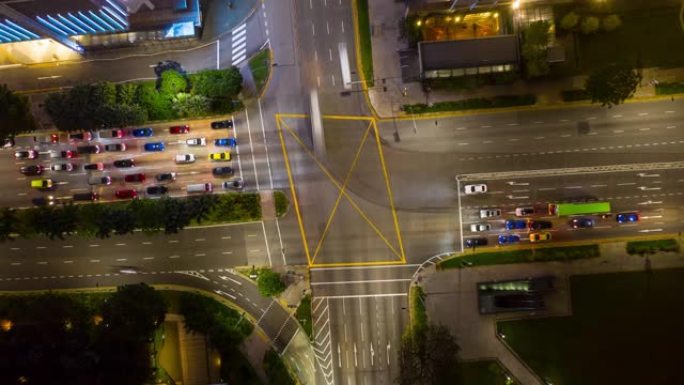 夜间照明新加坡市区交通街十字路口空中俯拍延时全景4k
