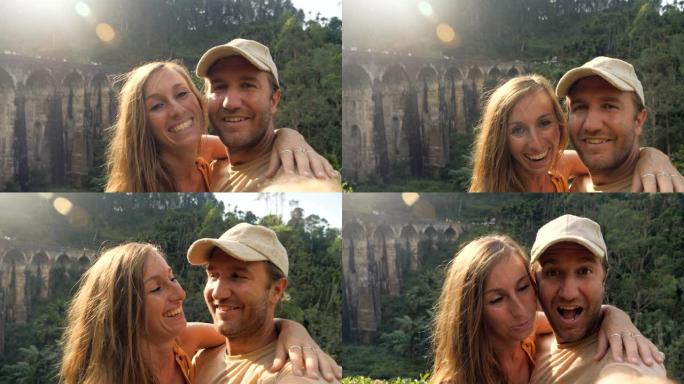 夫妇在斯里兰卡旅行时拍摄酷自拍视频。情侣有在线视频聊天自拍风格与朋友旅行冒险