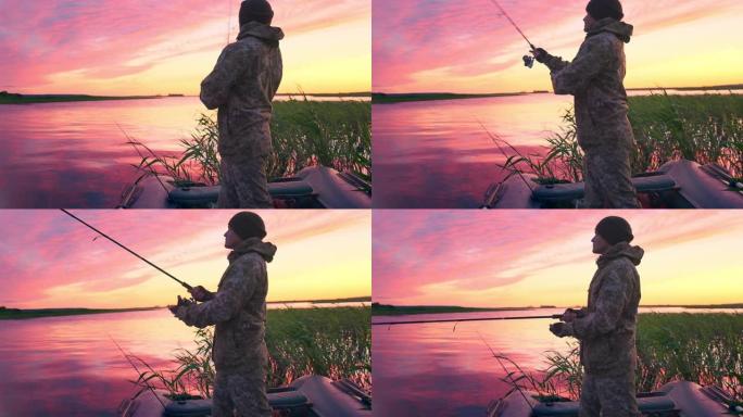日落时钓鱼的人。日落时在平静的湖上钓鱼的业余垂钓者