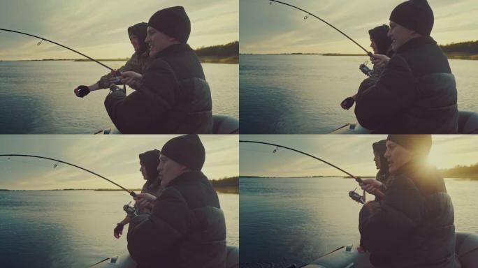 朋友钓鱼。两名业余垂钓者从船上钓鱼，并与奖杯鱼搏斗。鱼竿在大鱼下弯曲