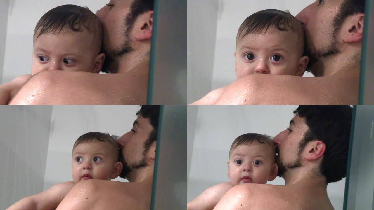 父亲抱着婴儿儿子婴儿学步车洗澡