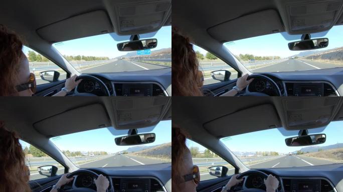 女人在高速公路上开车