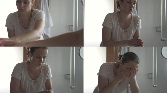 女人用液体洗面奶洗脸