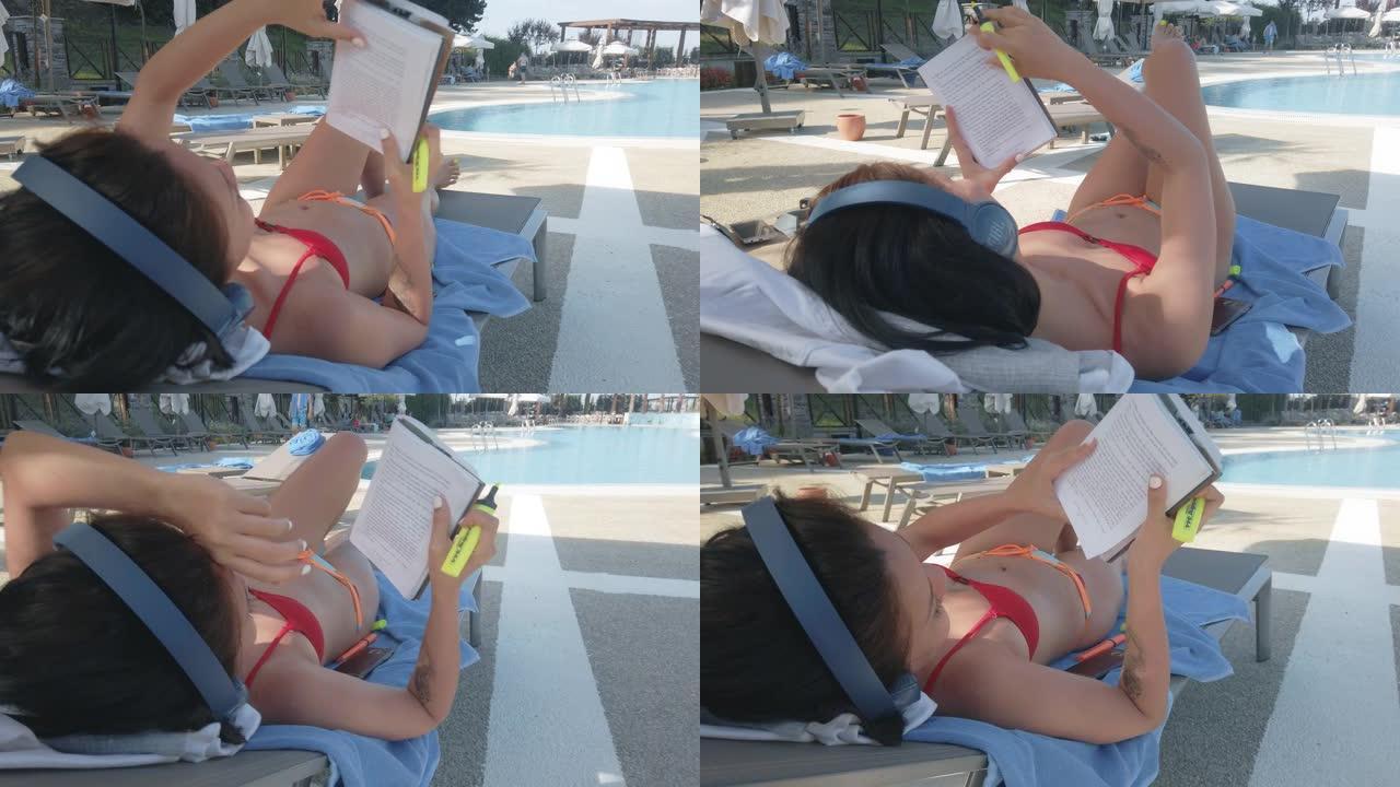 使用耳机，看书，在海滩上晒日光浴