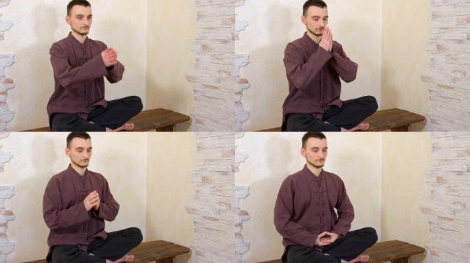 荷花放松的人在木凳上与脉轮冥想。瑜伽男子在木墙背景上的莲花体式练习脉轮冥想。