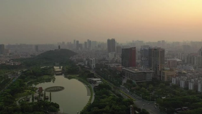 日落时间佛山市中心著名公园河滨湾空中俯拍全景4k中国
