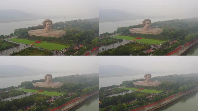 雨天长沙市著名滨江湾岛纪念碑拥挤公园航拍全景4k中国