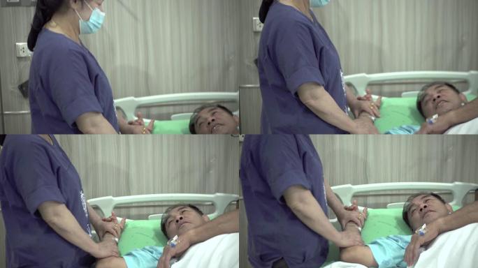 亚洲老年夫妇在医院生病时照顾。
