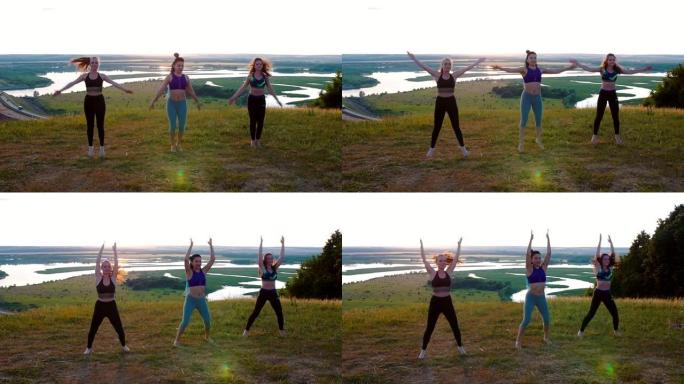自然健身——三个年轻女子在做运动——原地跳