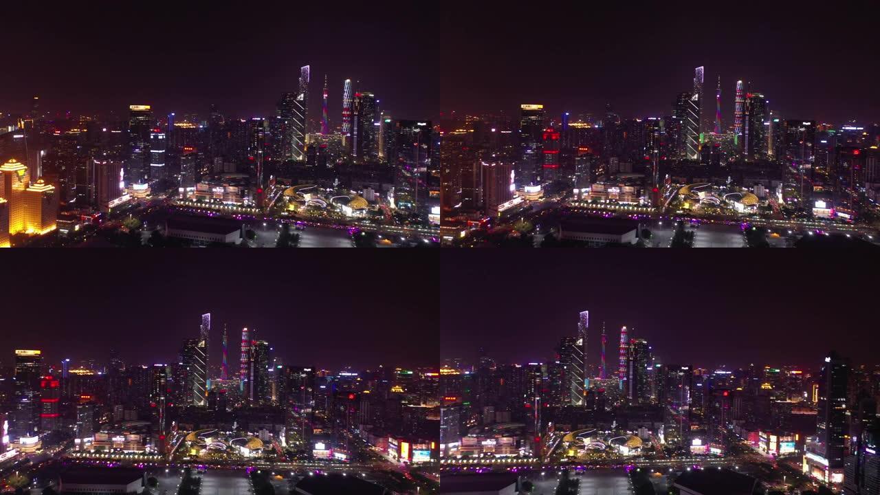 夜间照明广州市市中心著名购物中心交通街空中全景4k中国
