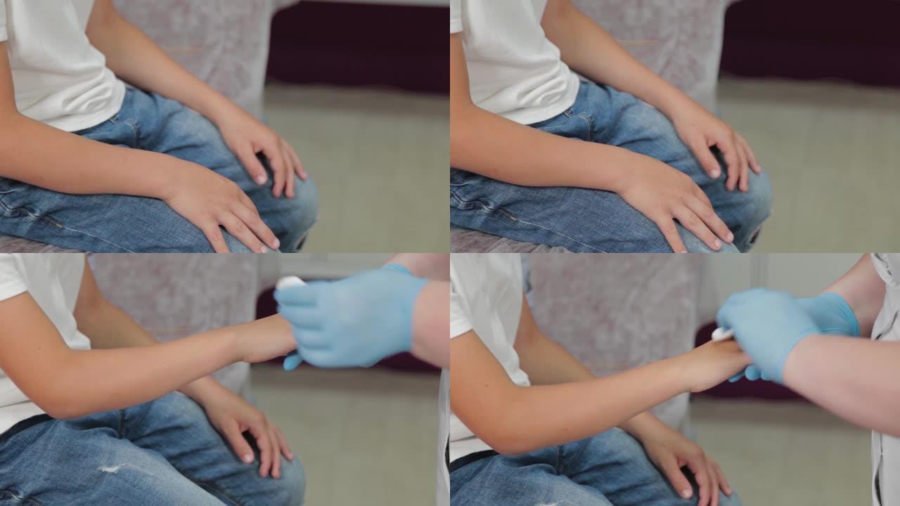 女医生用液氮去除男孩手臂上的疣