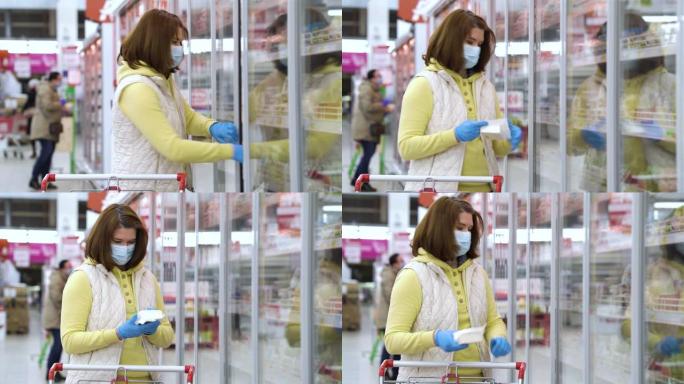 冠状病毒大流行期间戴面具的女孩在杂货店购买食物