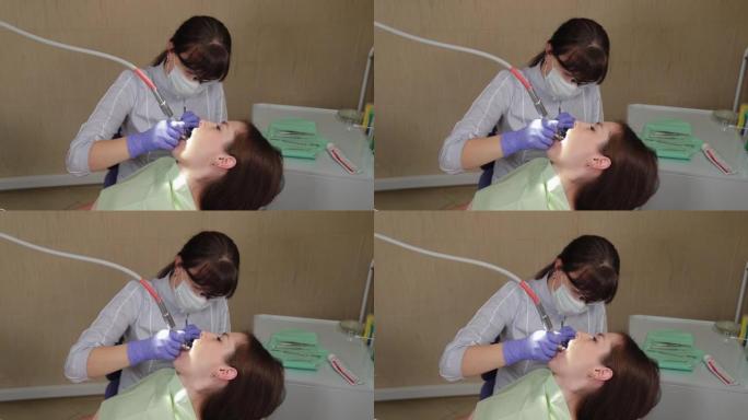 女牙医在医疗中心治疗牙齿